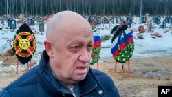 FILE - Wagner Group head Yevgeny Prigozhin is seen at the Beloostrovskoye cemetery outside St. Petersburg, Russia, Dec. 24, 2022.