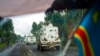 FILE - UN vehicles patrol the road leading to the front line in Goma, Democratic Republic of the Congo, Nov. 25, 2022.