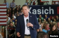 Republican U.S. presidential candidate John Kasich addresses supporters during a campaign stop in the gymnasium of University Liggett School in Grosse Pointe Woods, Mich., March 7, 2016.