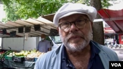 Voter Alain Fainac is backing centrist President Emmanuel Macron's party in France's legislative elections. (Lisa Bryant/VOA)