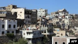 This picture shows traditional buildings damaged during years of fighting, in Yemen's rebel-besieged third city of Taez, on June 9, 2022.