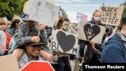 FILE - A demonstration to show solidarity with the Black Lives Matter movement takes place June 7, 2020, in Copenhagen, Denmark.