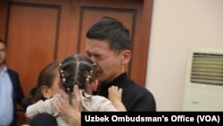 The Uzbek government has not revealed the current number of detainees from July protest, but the parliamentary commission says that, through its efforts, the Chief Prosecutor's Office has released 107 so far, including the one photographed here. (Uzbek Ombudsman's Office via VOA)