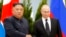 FILE - Russian President Vladimir Putin, right, and North Korea's leader Kim Jong Un shake hands during their meeting in Vladivostok, Russia, April 25, 2019.