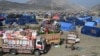 Pengungsi Afghanistan yang tiba dari Pakistan di kamp darurat dekat perbatasan Afghanistan-Pakistan Torkham di Provinsi Nangarhar pada 2 November 2023. (Foto: AFP)