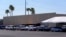 Dozens of vehicles line up to get food boxes at the St. Mary's Food Bank in Phoenix, Arizona, June 29, 2022. Long lines are back at outside food banks around the U.S. as working Americans overwhelmed by inflation increasingly seek handouts to feed their families.