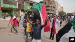 Sudanese demonstrators take to the streets calling for the restoration of civilian rule and denouncing the military government, in Khartoum, Sudan, July 31, 2022.