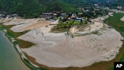 A view of the La Boca reservoir that supplies water to the northern city of Monterrey is almost dry as the northern part of Mexico is affected by an intense drought, in Santiago, Mexico, July 9, 2022. 