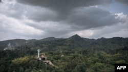FILE - The hydroelectric power plant is seen in Virunga National Park, in eastern Democratic Republic of Congo, April 1, 2022. The Democratic Republic of Congo is auctioning drilling rights in parts of the country's rainforest and peatlands.