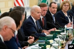 President Joe Biden participates in a working session with Saudi Crown Prince Mohammed bin Salman at the Al Salman Royal Palace, July 15, 2022, in Jeddah.