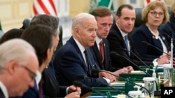 FILE - President Joe Biden participates in a working session with Saudi Crown Prince Mohammed bin Salman at the Al Salman Royal Palace, July 15, 2022, in Jeddah.