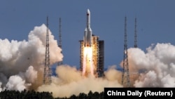 A Long March-5B Y3 rocket, carrying the Wentian lab module for China's space station under construction, takes off from Wenchang Spacecraft Launch Site in Hainan province, July 24, 2022.