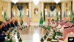 FILE - President Joe Biden participates in a working session with Saudi Crown Prince Mohammed bin Salman at the Al Salman Royal Palace, July 15, 2022, in Jeddah, Saudi Arabia.