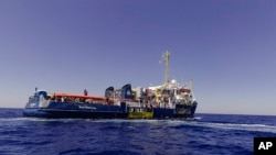 The German charity Sea-Watch 3 with 444 people on board in the central Mediterranean, July 24, 2022. . (Nora Boerding/Sea-Watch via AP)