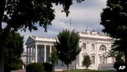FILE - The White House is seen, July 30, 2022, in Washington. President Joe Biden tested positive for COVID-19 again Saturday, slightly more than three days after he was cleared to exit coronavirus isolation.