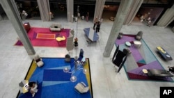 Creations of carpets and furnitures by designer Martino Gamper are displayed as part of the installation 'Innesto' at the Nulufar gallery, during the Design Fair exhibition in Milan, Italy, June 9, 2022.