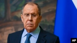 FILE - In this photo released by Russian Foreign Ministry Press Service, Russian Foreign Minister Sergey Lavrov is seen during a news conference in Moscow, April 26, 2022.