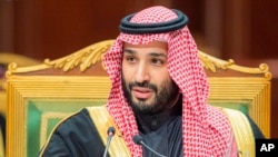 FILE - In this photo released by Saudi Royal Palace, Saudi Crown Prince Mohammed bin Salman, speaks during the Gulf Cooperation Council (GCC) Summit in Riyadh, Saudi Arabia, Dec. 14, 2021. 