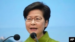 FILE - Hong Kong Chief Executive Carrie Lam speaks during a press conference in Hong Kong, on Nov. 23, 2021.