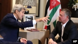 Jordanian King Abdullah II, right, meets with U.S. Secretary of State John Kerry at the Royal Palace in Amman, Jordan, Oct. 24 2015.