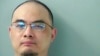 FILE - This photo provided by the Butler County, Ohio, jail shows Xu Yanjun. Xu, a Chinese national convicted of trying to steal trade secrets from U.S. aviation and aerospace companies, has been sentenced to 20 years in prison.