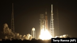 NASA's new moon rocket lifts off from theKennedy Space Center in Cape Canaveral, Fla., Wednesday, Nov. 16, 2022. (AP Photo/Terry Renna)