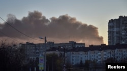 Smoke rises over Lviv, Ukraine, after Russian missile strikes on Nov. 15, 2022.