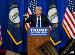 FILE - Then-Republican presidential candidate Donald Trump speaks during a rally in Louisville, Kentucky, March 1, 2016. At the time, Trump was telling voters he had no business dealings in Russia while his personal lawyer was negotiating a Moscow 'Trump Tower' project through the November 2016 election.