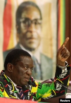 FILE - Vice President Emmerson Mnangagwa addresses a ZANU PF Central Commitee meeting in Harare, Zimbabwe, April 7, 2017.