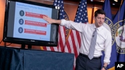 House Speaker Paul Ryan of Wisconsin uses charts and graphs to make his case for the Republican Party's long-awaited plan to repeal and replace the Affordable Care Act, during a news conference on Capitol Hill in Washington, March 9, 2017. 