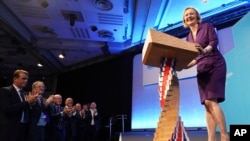 Liz Truss speaks at the Queen Elizabeth II Centre in London, Sept. 5, 2022. 