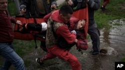 En fotos: La guerra se refleja en los rostros de los heridos