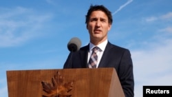 FILE - Canada's Prime Minister Justin Trudeau speaks in Ottawa, Ontario, Canada, Sept. 5, 2022. On Monday, addressing the "women who are protesting in Iran and those who support them," Trudeau said: "We are with you."