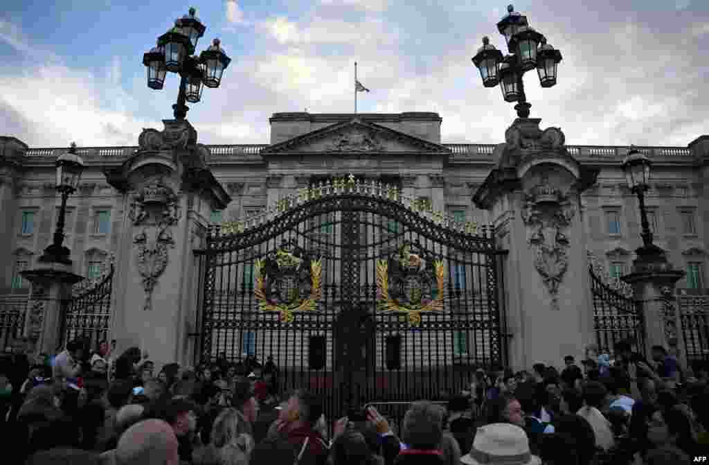 A union flag flies at half-staff atop Buckingham Palace after the announcement that Queen Elizabeth II had died, in central London, Sept. 8, 2022.