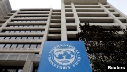 FILE - The International Monetary Fund headquarters building in Washington, April 8, 2019. 