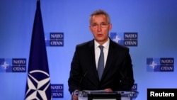 NATO Secretary-General Jens Stoltenberg attends a joint news conference with North Macedonian Prime Minister Dimitar Kovacevski in Brussels, Belgium, Feb. 3, 2022.