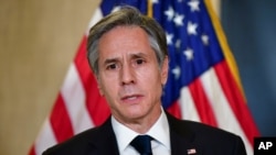 FILE - U.S. Secretary of State Antony Blinken speaks to the media after a closed-door morning session of U.S.-China talks in Anchorage, Alaska, March 19, 2021.
