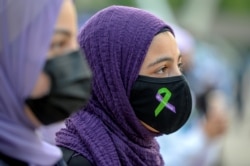 Masyarakat melakukan protes terhadapi Islamofobia, di Toronto, Ontario, Kanada 18 Juni, 2021. (Foto: REUTERS/Alex Filipe)