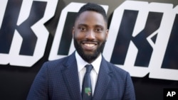 John David Washington arrives at the premiere of "BlacKkKlansman," Aug. 8, 2018, at the Samuel Goldwyn Theater in Beverly Hills, Calif.