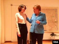 德国总理默克尔在北京会见人权律师王全璋的妻子李文足等709维权人士。（李文足脸书图片）