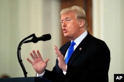 President Donald Trump speaks during a news conference in the East Room at the White House in Washington, Nov. 7, 2018.