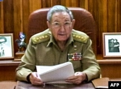 A screenshot from Cuban television shows President Raul Castro addressing the country, in Havana, Dec. 17, 2014.