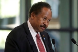 FILE - Sudanese Prime Minister Abdalla Hamdok speaks during a session of the summit to support Sudan in Paris, May 17, 2021. Hamdok announced his resignation, Jan. 2, 2021.