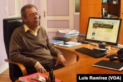 Bernard Chateau, the mayor of Beaumont-en-Veron, France, said most people were of a spirit to say, "Why not, let’s try to do something" regarding the government’s plan to open reintegration centers.