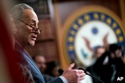 Senate Minority Leader Sen. Chuck Schumer of N.Y. speaks at a news conference on Capitol Hill in Washington, Dec. 21, 2017.
