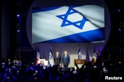 French President Emmanuel Macron and Israeli Prime Minister Benjamin Netanyahu attend the opening ceremony of the France-Israel season event in Paris, France, June 5, 2018.