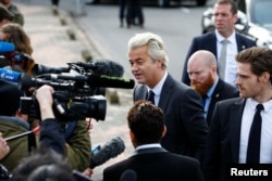 FILE - Dutch far-right leader Geert Wilders speaks to the press in Amsterdam, Netherlands, March 5, 2017.