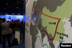 FILE - A map illustrating China's silk road economic belt and the 21st century maritime silk road, or the so-called "One Belt, One Road" megaproject, is displayed at the Asian Financial Forum in Hong Kong, China Jan. 18, 2016.