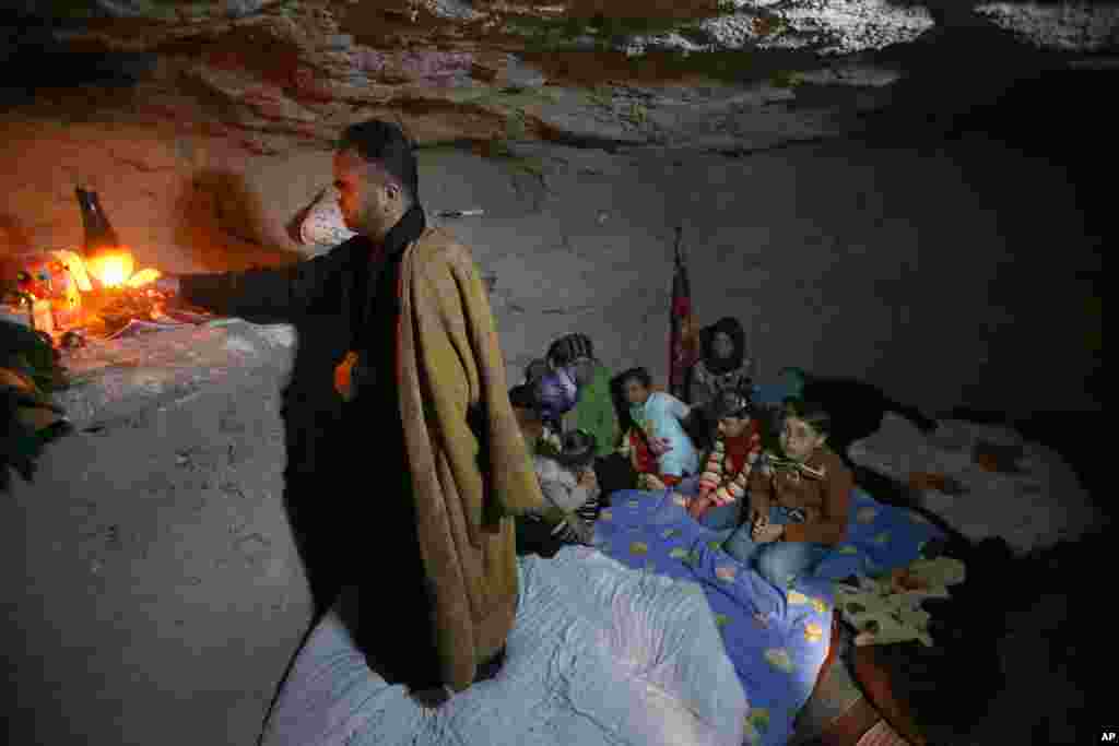 Local residents ride a boat on a flooded road overflown by the Bago river at a low-lying part in Bago, 80 kilometers (50 miles) northeast of Yangon, Myanmar.