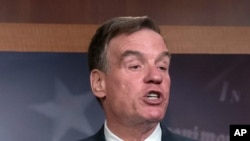 FILE: Sen. Mark Warner, D-Va., vice-chair of the Senate Intelligence Committee
